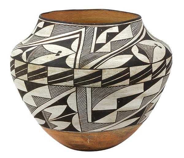 Acoma polychrome decorated olla: Acoma polychrome decorated olla, executed by Marie Zieu Chino (1907-1982), the shouldered form having a geometric decorated surface terminating on the circular base inscribed in graphite, Marie Z. Chi