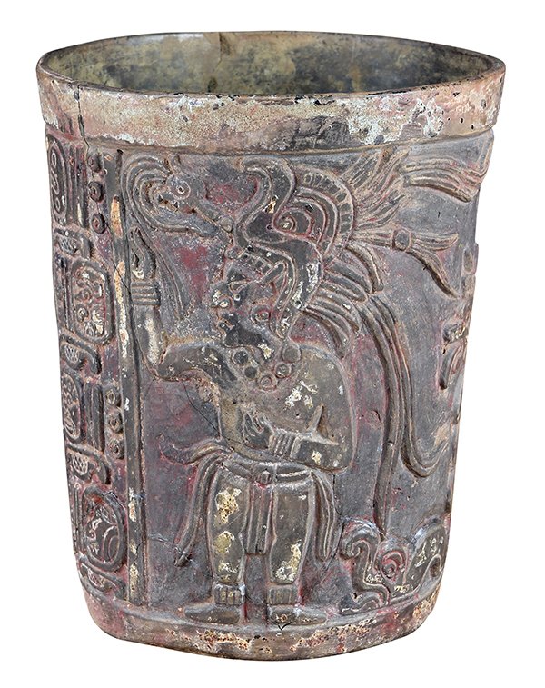 Pre-Columbian clay Mayan cylinder vessel, classical: Pre-Columbian clay Mayan cylinder vessel, classical period 600-900 AD, the exterior having carved and incised decoration executed in two panels depicting each having the profile of a standing lord wea
