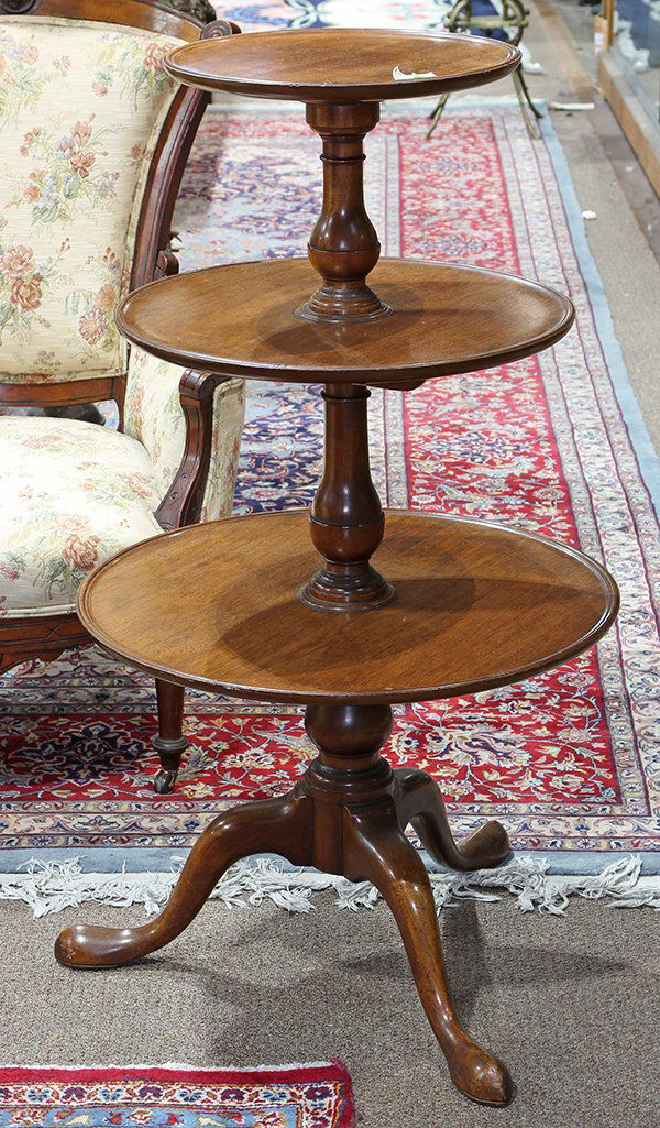 George III mahogany tripod petit four table second: George III mahogany tripod petit four table second quarter 18th century, the top associated, with baluster stem, and rising on a tripod base, Provenance: From the Ligonier, PA estate of Richard Mellon