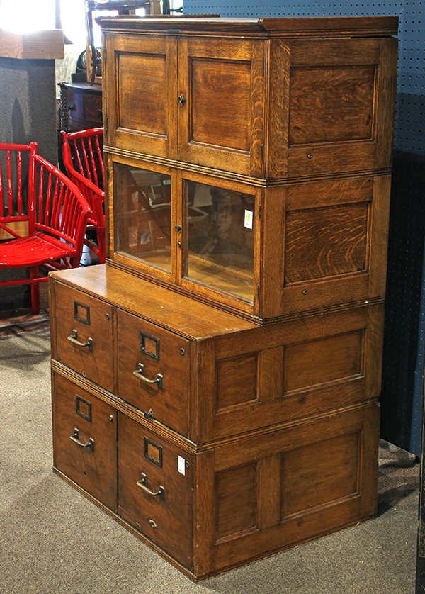 Yawman and Erbe Co.: Yawman and Erbe Co., Rochester, New York stackable filing cabinet, executed in quartersawn oak, the case having four drawers, retaining original pulls, 57"h x 33"w x 25"d