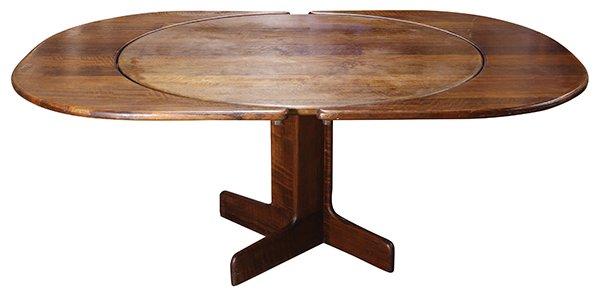Mid-Century Modern dining table by Gerald McCabe: Mid-Century Modern dining table by Gerald McCabe (California, 1927-2010), circa 1960, executed in African Sedua wood, the top having two 12" l cresent leaves, continuing to the pedestal standard, 29"h