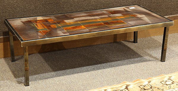Mid Century tile top low table attributred to Roger: Mid Century tile top low table attributred to Roger Capron (1922-2006), having an organic decorated 21 tile top rising on square tubular legs, 12.5"h x 43.5"w x 19.5"d