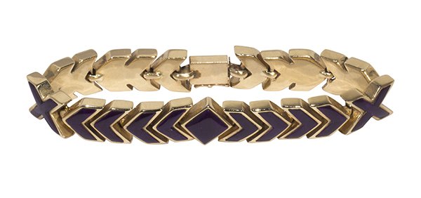 Sugilite and 14k yellow gold bracelet: Sugilite and 14k yellow gold bracelet one geometric link 14k yellow gold bracelet, inlayed with fine dark purple sugilite, width 10.9 mm, length 6 3/4", weighs 51.4 grams