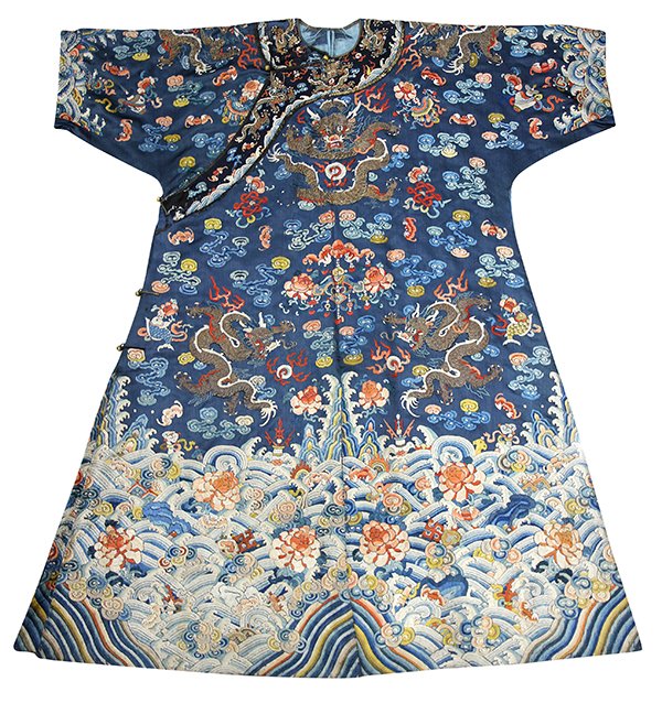 Chinese Blue Dragon Robe: Chinese blue ground jifu robe, gilt couched with nine five-claw dragons meandering amid clouds and Buddhist treasures, above rolling waves with peonies and various auspicious items (sleeves cut), 56"h