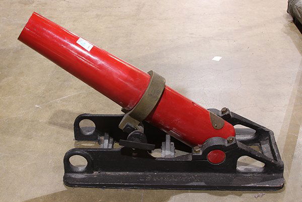 U.S. Coast Guard line throwing cannon or Lyle gun: U.S. Coast Guard line throwing cannon or Lyle gun, first half 20th century, having a steel tube with a red enamel coating, brass fittings, and a brass plaque reading 'Sculler / Safety Corp. 122 Broad