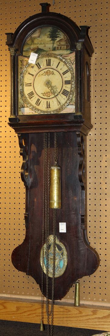 Dutch wall clock, circa 1800, having an arched crest, (1 of 2)