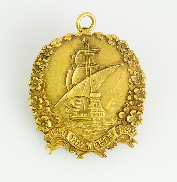 Edwardian 14k yellow gold pendant-brooch: Edwardian 14k yellow gold pendant-brooch one 14k yellow gold textured society pendant-brooch, depicts the Mayflower and the embossed inscription 1620 Plymouth 1897, the reverse with the embossed inscr