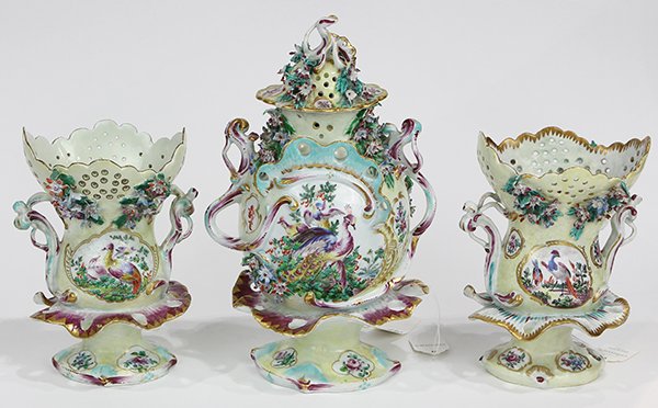 English Bow porcelain yellow ground vase with garniture: English Bow porcelain yellow ground vase with garniture, late 18th / early 19th century, the centerpiece with applied floral sprays cascading down the pierced lid, continuing to the central hand paint