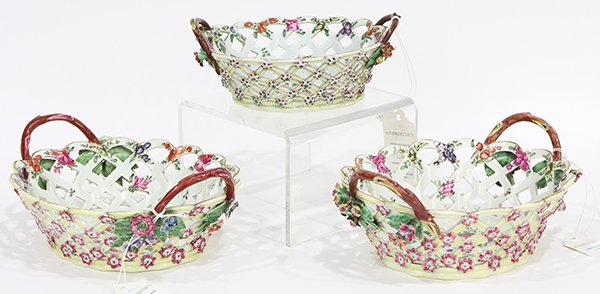 Worcester polychrome decorated porcelain baskets: (lot of 3) Worcester polychrome decorated porcelain baskets, circa 1770, each having a pierced trellis body flanked with stylized branch handles, the interior painted with polychrome floral sprays, la