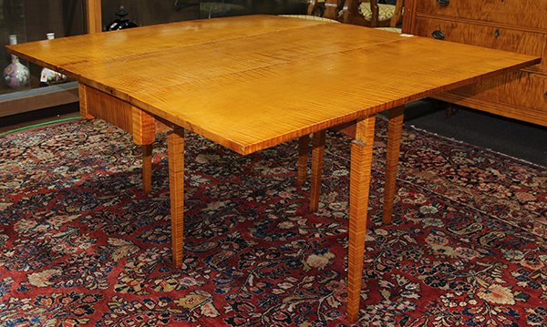 Hepplewhite tiger maple drop leaf table: Hepplewhite tiger maple drop leaf table, circa 1800, having a square top with rectangular drop leaves, the whole rising on tapering square legs, (open) 28.25"h x 55"w x 48"d; (closed) 28.25"h x 19"w x