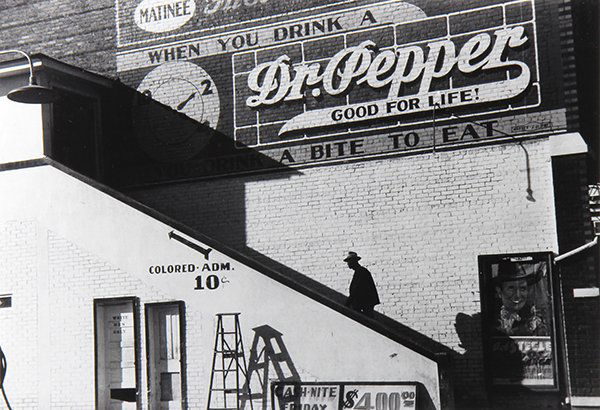 Photograph, Marion Post Wolcott: Marion Post Wolcott (American, 1910-1990), "Negro Man Climbing the Stairs to the Movie Theater, on a Saturday Afternoon, Belzoni Mississippi Delta, Mississippi," 1939, gelatin silver print, later prin