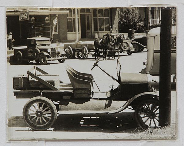 Photography, Walker Evans: Walker Evans (American, 1903-1975), "Bucket-Seat Model T, Alabama Town," 1935, gelatin silver print, artist name stamp verso, image/sheet: 5"h x 6.25"w, overall (with mat): 20"h x 16"w. Provenance: Th
