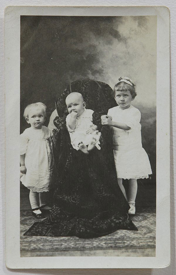 Photograph, Michael Disfarmer: Michael Disfarmer (Amercian, 1884-1959), "Untitled (Portait of Three Young Children)," circa 1920-45, gelatin silver print, image: 5"h x 2.75"w, sheet: 5.5"h x 3.5"w, artist board: 11"h x 8.5"w, overa