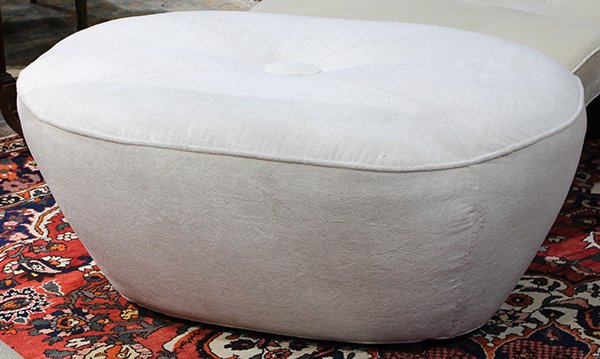 Custom moderne tufted white upholstered ottoman: Custom moderne tufted white upholstered ottoman, having an ovoid form, 20"h x 42"w x 29"d