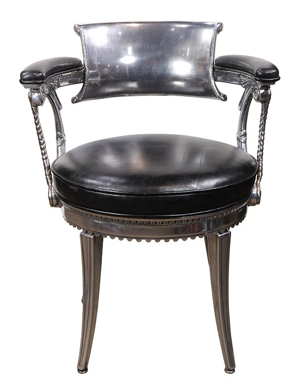 Dorothy Draper (1889-1969) armchair: Dorothy Draper (1889-1969) armchair, circa 1940, cast aluminum with a crown on the back of each chair, upholstered with black leather, Note: from the Nob Hill Fairmont Hotel's famous ''Crown Room'', B