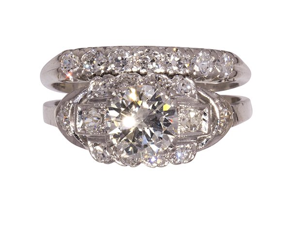 Art Deco diamond, platinum engagement ring and wedding: Art Deco diamond, platinum engagement ring and wedding band featuring a platinum mounting centered by a transitional round brilliant cut diamond weighing approximately 1.10 cts., accented by (12) old 