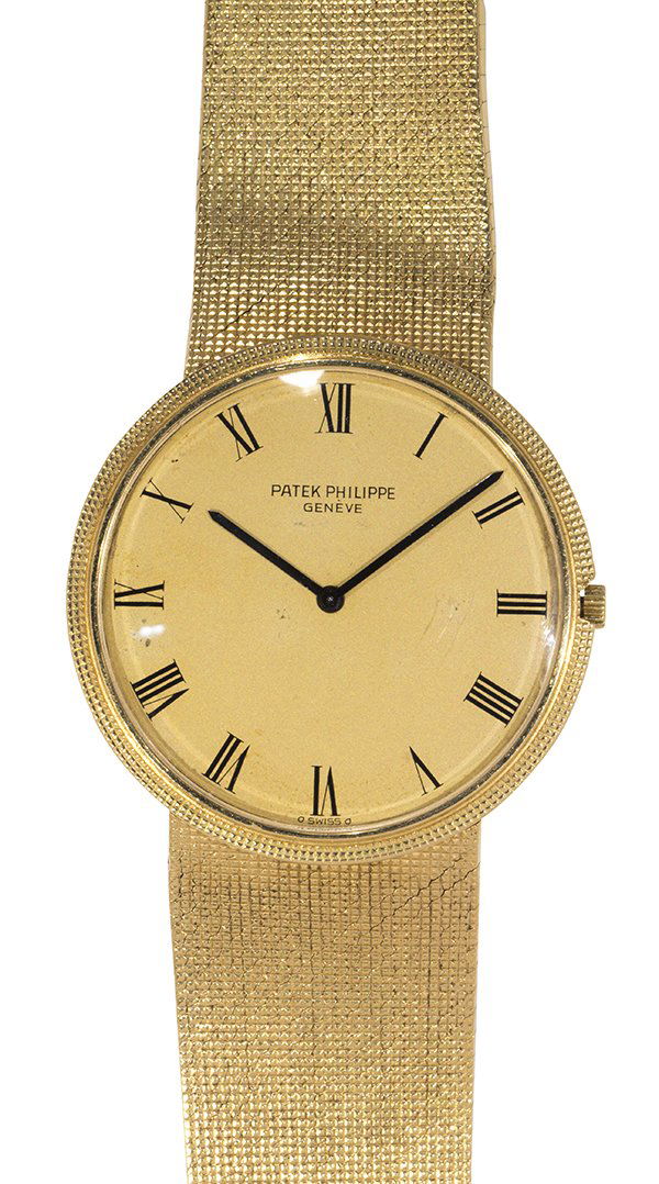 Gentlemen's Patek Philippe Calatrava 18k yellow gold: Gentlemen's Patek Philippe Calatrava 18k yellow gold wristwatch, ref. 3588, circa 1971 Dial: gold, round, black Roman numeral hour markers, black baton hands, Patek Philippe Geneve Movement: automatic