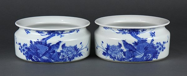 Two Chinese Blue and White Brush Washers: (lot of 2) Chinese underglaze blue large porcelain brush washers, both with a wide mouth, flared rim and short neck above a canted shoulder and shallow cylindrical body, decorated with pheasant and pe