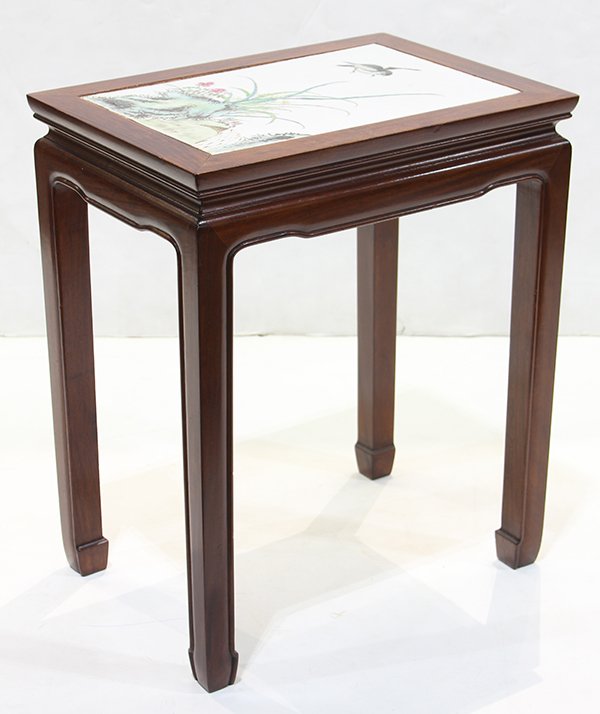 Chinese Wood Stand with Porcelain Plaque, Bird: Chinese enameled porcelain tile set on a wood stand, the porcelain painted with a bird above orchids issuing from rock work, having a bead edge apron above straight support with hoof terminals, 22"h x