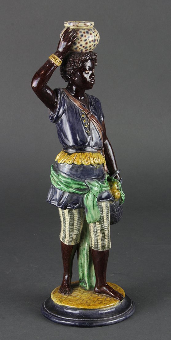 Continental majolica figural candle holder in the form (1 of 2)