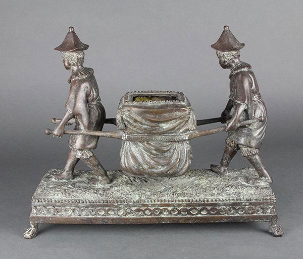 Figural patinated bronze jardiniere executed in the (1 of 3)