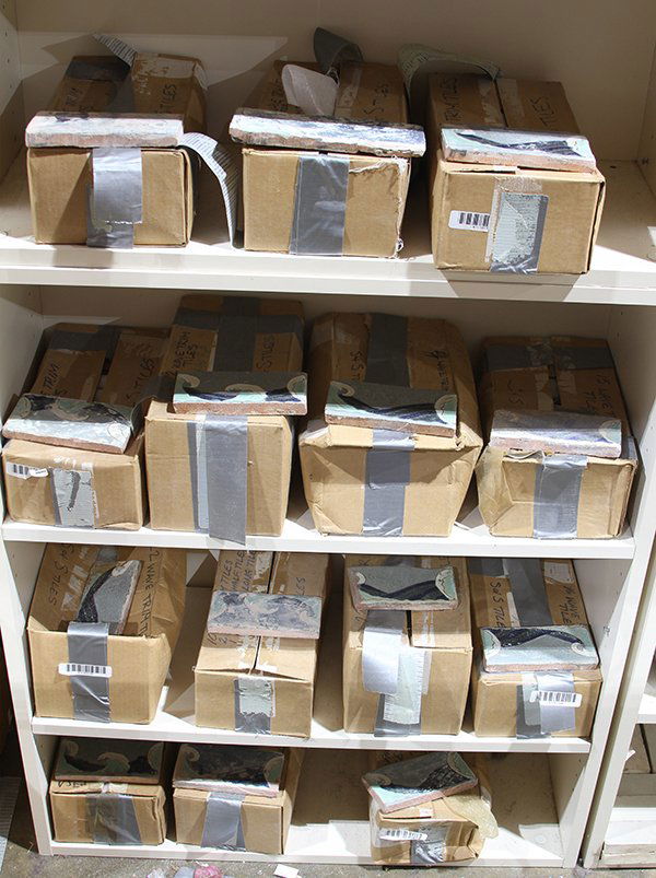 (lot of 120 plus) Four shelves of  wave tiles executed (1 of 1)