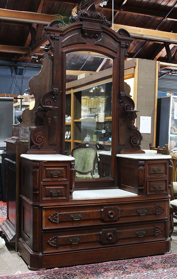 Renaissance Revival bedroom suite by Berkey and Gay: Renaissance Revival bedroom suite by Berkey and Gay, Grand Rapids circa 1870, executed in walnut, burl veneer, and marble, comprising a bedstead with a monumental carved headboard, having an acanthus