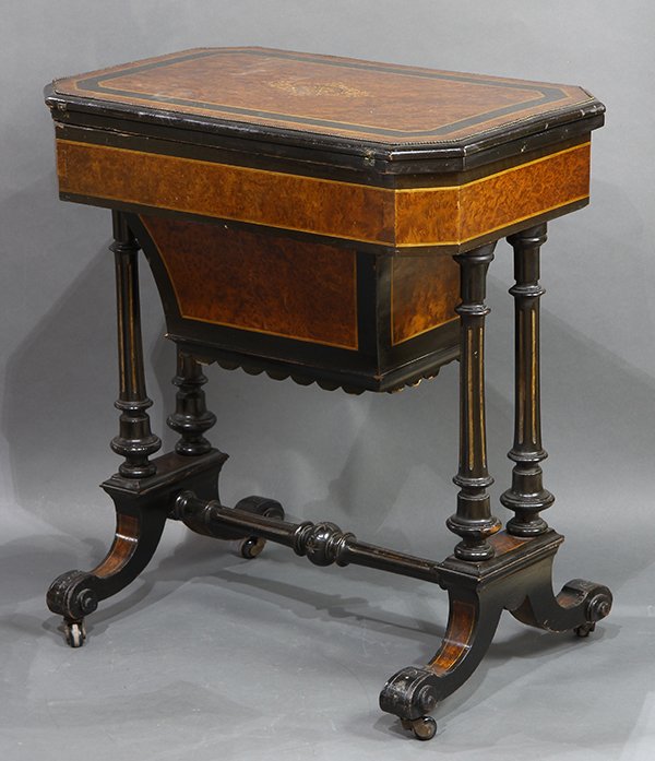 Napolean III style partial ebonized and burl walnut: Napolean III style partial ebonized and burl walnut work box and games table, Grand Rapids circa 1870, having a rectangular top centering a marquetry decorated reserve, folding open to reveal an inlai