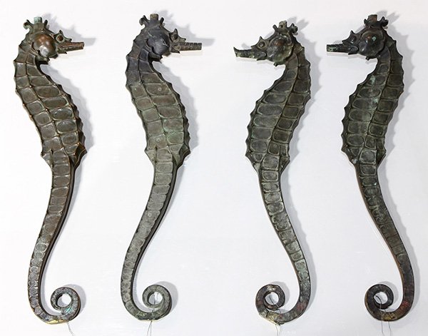 (lot of 4) Patinated bronze figural sculptures,: (lot of 4) Patinated bronze figural sculptures, designed by Thomas John Kent, installed in 1923, each depicting seahorses, original to the Steinhart Aquarium, Golden Gate Park, 22"h. Provenance: Prope