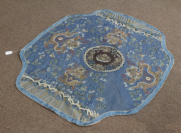 Chinese Blue Ground Kesi Collar: Chinese kesi woven collar, featuring four mang dragons meandering on a blue ground amid ruyi clouds, bats and Buddhist treasures above rolling waves, 41.5"w