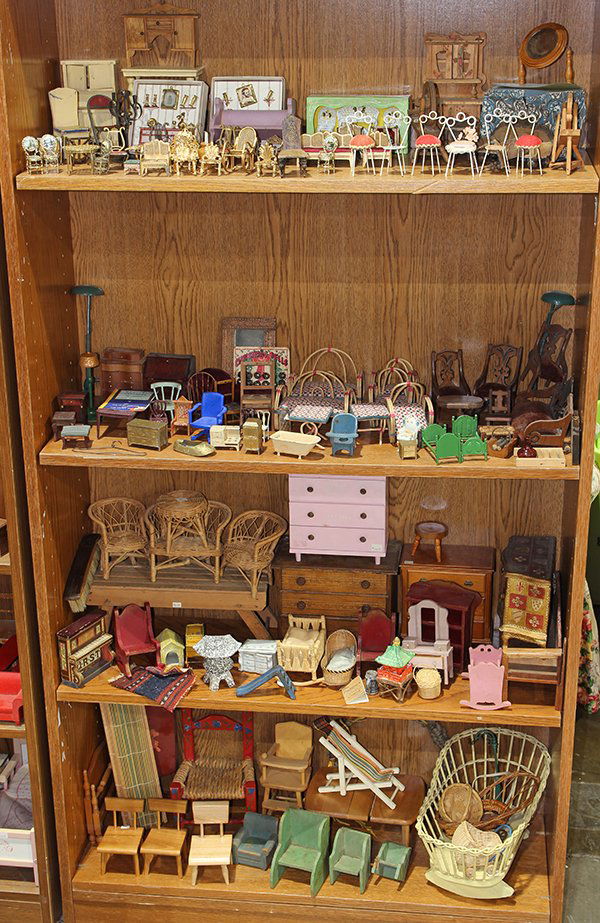 Four shelves of doll house furniture (1 of 5)