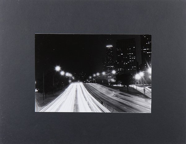 Photographs of Life in Chicago: (lot of 5) American School (20th century), Freeway in Chicago at Night, Waiting for the Porta Potties, Top Shelf of the Fridge, The Smiling Clown, and 2 Guys Making a Splash, gelatin silver prints, al