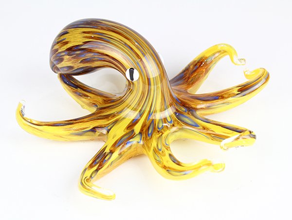 Murano art glass sculpture of an octopus executed with: Murano art glass sculpture of an octopus executed with mottled gold, blue, and brown cased glass, 3.5"h x 8.25"w x 8.75"d