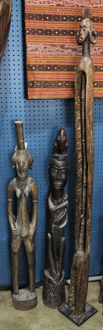 (lot of 3) West African carved figures including a (1 of 5)