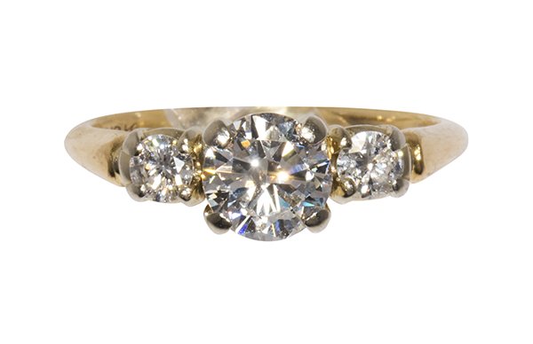 Diamond, 14k yellow and white gold ring: Diamond, 14k yellow and white gold ringcentering (1) round brilliant cut diamond weighing approximately 0.70 ct., flanked by (2) full cut diamonds weighing a total of approximately 0.25 ct., set in a