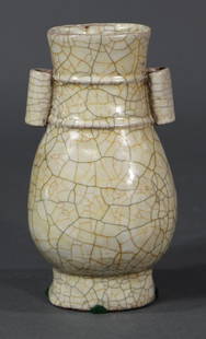 Chinese Ge-type Arrow Vase: Chinese Ge-type arrow vase, the flattened hu form with a pair of tubular handles flanking a neck decorated with two raised bands, the tall splayed foot with two apertures, overall suffused with a netw