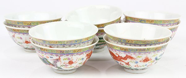 Ten Chinese Porcelain Tea Bowls: (lot of 10) Chinese enameled porcelain tea bowls, featuring dragons and phoenix below a key-fret band, the base with an apocryphal Qianlong mark, 3.75"w; Provenance: Estate of Reynold Tom of Oakland, 