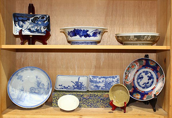 Two Shelves of Japanese and Chinese Ceramics, Imari (1 of 2)