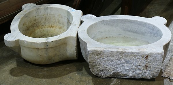 Pair of marble sinks, each having a shaped top, above a: Pair of marble sinks, each having a shaped top, above a circular basin, 7.5"h x 18.5"w x 15"d