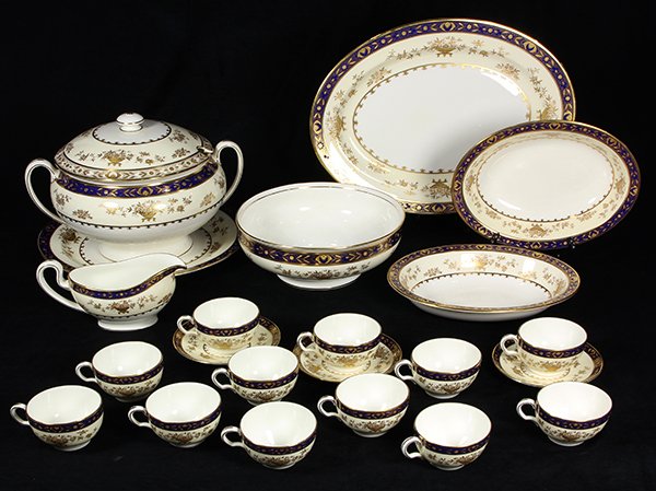 (Lot of 19) Minton Porcelain "Dynasty" cobalt and gilt: (Lot of 19) Minton Porcelain "Dynasty" cobalt and gilt bone china, including (1) serving platter, (2) oval form rimmed servers, a lidded tureen with undertray, a serving bowl, sauce boat, and (12) tea