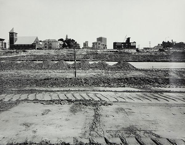 Photograph, Catherine Wagner: Catherine Wagner (American, b. 1948), Untitled (Landscape with Tractor Tracks), 1979, gelatin silver print, pencil signed and dated lower right, image: 14"h x 17.75"w , sheet (unframed): 16"h x 20"w.