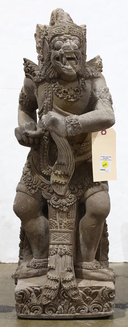Indonesian Sculpture: Indonesian/Balinese sculpture, of a mythical beast with the left arm held across the chest, the back of the base reads 'Ngada', 31"h