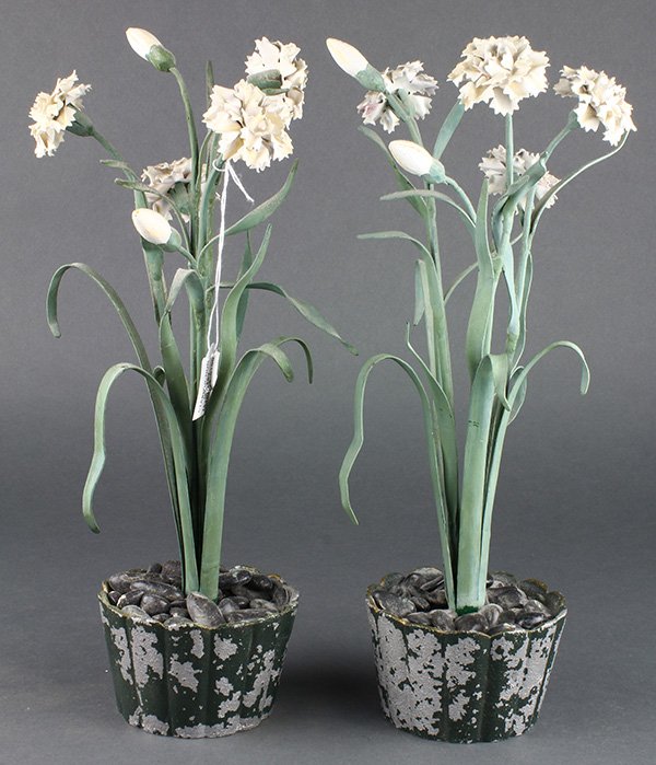 Pair of Italian sculptural carnation plants, executed: Pair of Italian sculptural carnation plants, executed in tole decorated metal, 14"h. Provenance: Property from the Christian de Guigne' IV Estate, Hillsborough, CA