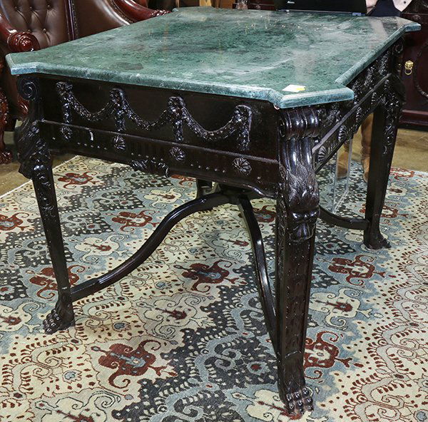 Renaissance style marble top center table, having a (1 of 2)