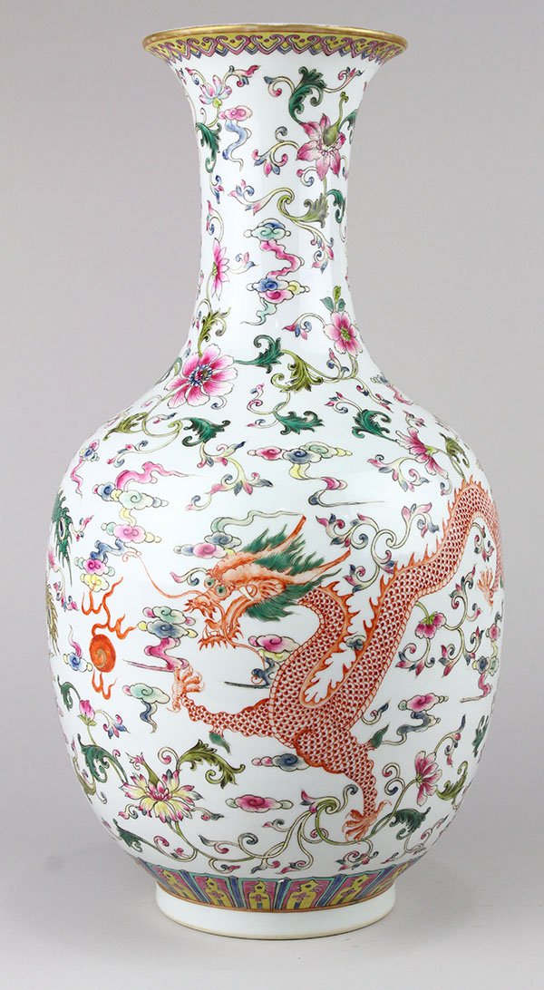 Chinese Porcelain Vase, Dragon/Phoenix: Chinese enameled porcelain vase, with a trumpet neck and ovoid body decorated with dragon and phoenix amid floral scrolls, base with apocryphal Guangxu mark, 14.75"h