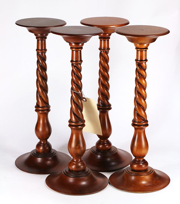 (lot of 4) Baroque style candlestands, executed in (1 of 1)