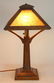 Arts and Crafts slag glass and oak table lamp, having a