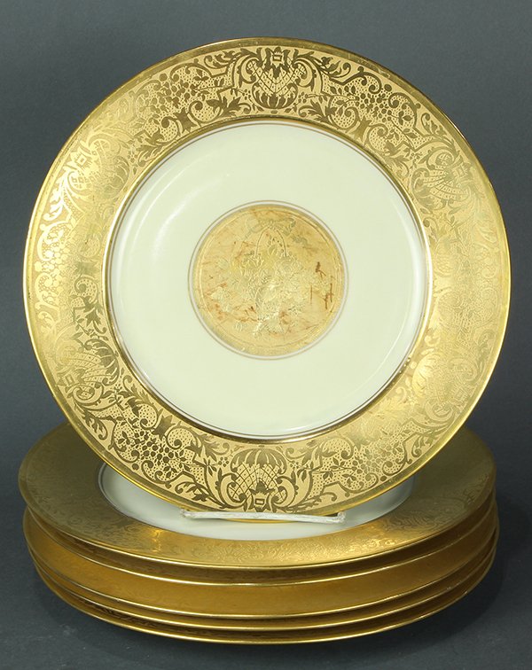 (Lot of 6) Bavarian partial gilt service plates, each: (Lot of 6) Bavarian partial gilt service plates, each having a foliate decorated border, surounding a central floral bouquet, on a white ground, 11"dia.