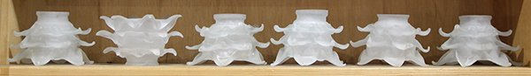 (lot of 6) Art Nouveau style frosted glass shades, each: (lot of 6) Art Nouveau style frosted glass shades, each having a tiered floral form, each: 3.5"h