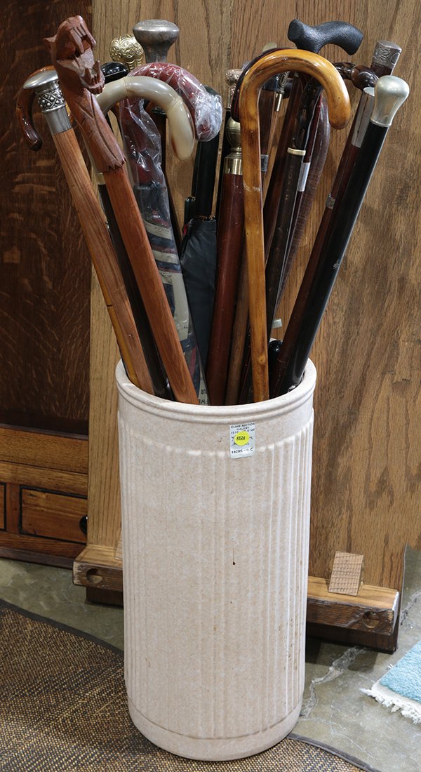 (Lot of 15+) Assortment of canes and umbrellas, in a (1 of 1)